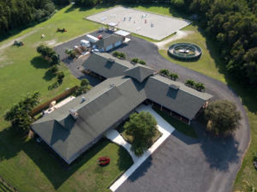 Newly remodeled private sport horse farm. 10 acres with additional land available. 3Br, 2.5Ba owner's residence with office and attached 1Br, 1Ba in-law apartment with kitchen. High ceilings, 2 fireplaces, granite counter-tops, marble floors, cypress ceilings, amazing restaurant grade kitchen with pizza oven. The newly upgraded 20 stall barn has a 2 bedroom groom's quarters with kitchen above. Facility includes a fully irrigated 220' x 120' ring with new Martin Collins CLOPF footing, 1 acre grass jump field, a 4 horse walker, 13 irrigated paddocks, large 4 car storage/workshop building, 6 covered hot/cold wash stalls with filtered water. 2 tack rooms. Separate client full bathroom. Large covered pergola for spa/treadmill Deep 1.5 acre lake and endless bridle trails adjacent to farm.