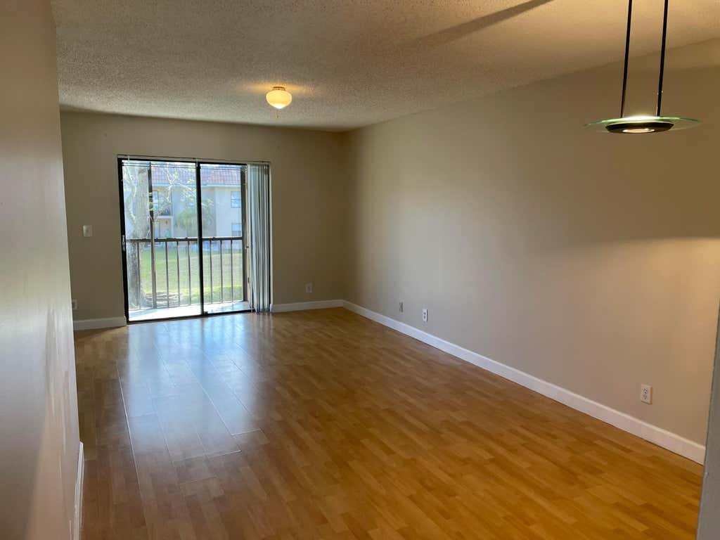 Photo of 6832 Palmetto Circle S #203, Boca Raton, FL 33433 (MLS # B26057922)
