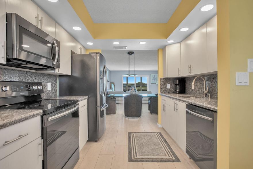 TOTALLY REMODELED 'IRIS' FLOOR PLAN; IMPACT WINDOWS, FRONT DOOR AND INTERIOR SLIDING IMPACT DOORS, KITCHEN AND BATHROOMS REMODELED 2017. NO CARPET. NEWER AC 2024, WATER HEATER 2017. STAINLESS STEEL APPLIANCES, TURN KEY FURNISHED JUST BRING YOUR TOOTHBRUSH AND BATHING SUIT. ALL CUSTOM WINDOW TREATMENTS PLANTATION SHUTTERS. MAGNIFICENT SUNSETS PANORAMIC UNOBSTRUCTED WATER AND VILLAGE POOL VIEWS. SEE ALL PHOTOS THEN SEE FOR YOURSELF. VACANT