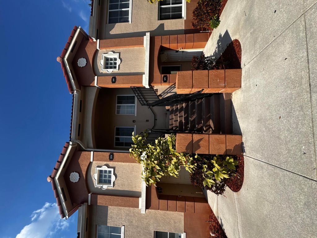 Photo of 3810 N Jog Road #105, Royal Palm Beach, FL 33411 (MLS # B26008519)