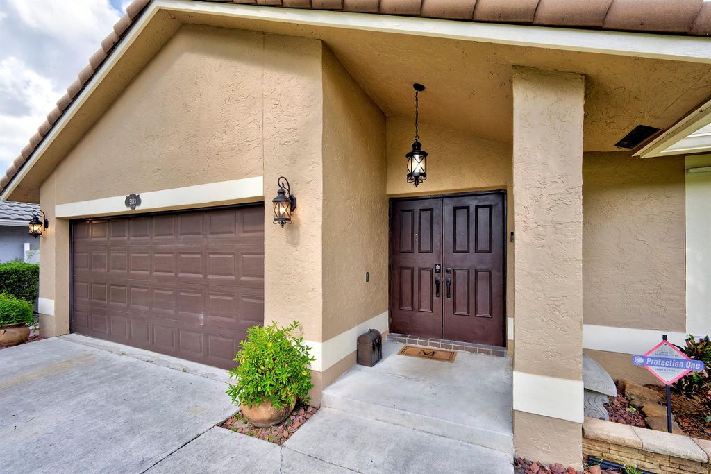 Photo of 5133 NW 47th Avenue, Coconut Creek, FL 33073 (MLS # F10534305)