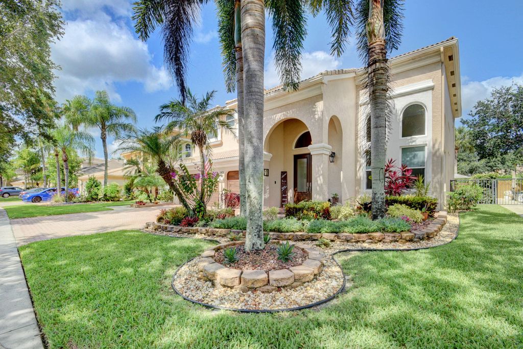 Photo of 6431 Stonehurst Circle Cir, Lake Worth Beach, FL 33467 (MLS # R10809774)