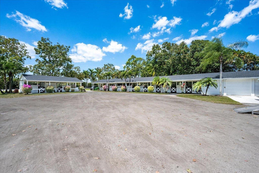 Photo of 4491 Palm Breeze Trail, Wellington, FL 33414 (MLS # B26052324)