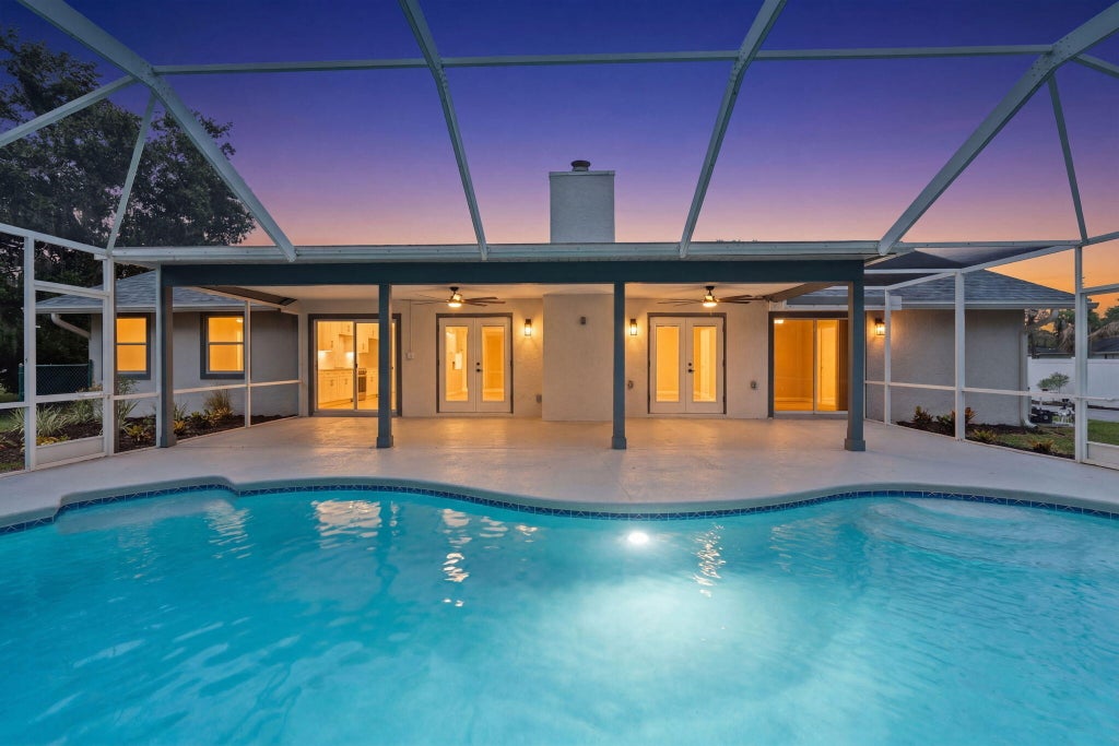 Photo of 1952 SW Import Drive, Port Saint Lucie, FL 34953 (MLS # B26046793)