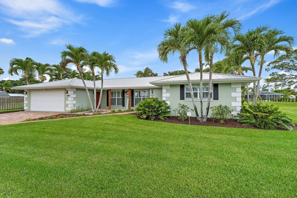 Photo of 2880 SE San Jeronimo Road, Port Saint Lucie, FL 34952 (MLS # R11098745)