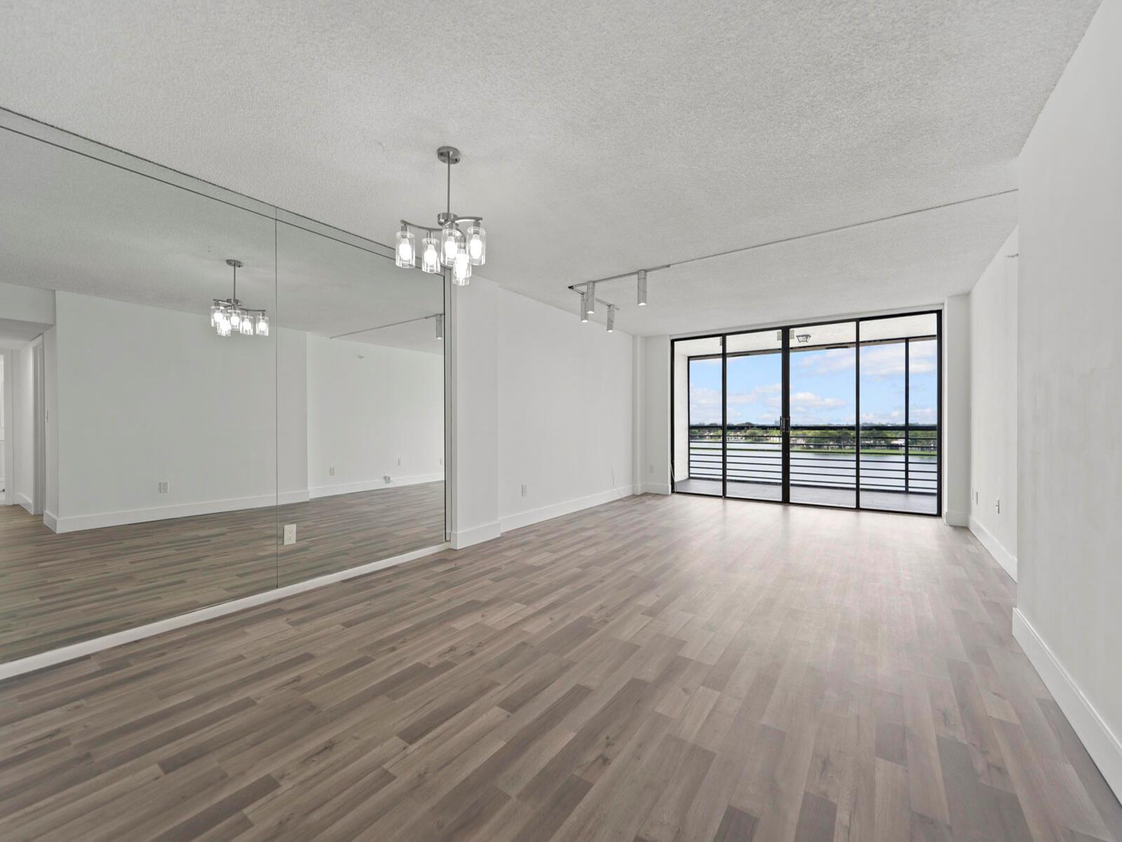 Experience Miami comfort-living in this 2-bed, 2-bath condo on the highest floor, boasting panoramic lake views from a private balcony. Nestled in a gated community with pool access, enjoy modern comforts including a sleek kitchen, primary suite with a large walk-in closet, and prime location near dining and entertainment. Whether you're seeking a full-time residence or an investment opportunity, this condo offers the perfect blend between comfort and convenience.