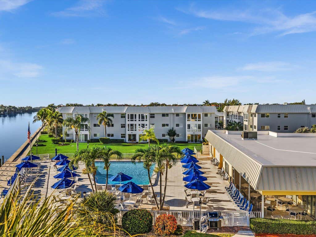 Photo of 33 Colonial Club Drive #203, Boynton Beach, FL 33435 (MLS # B26016637)