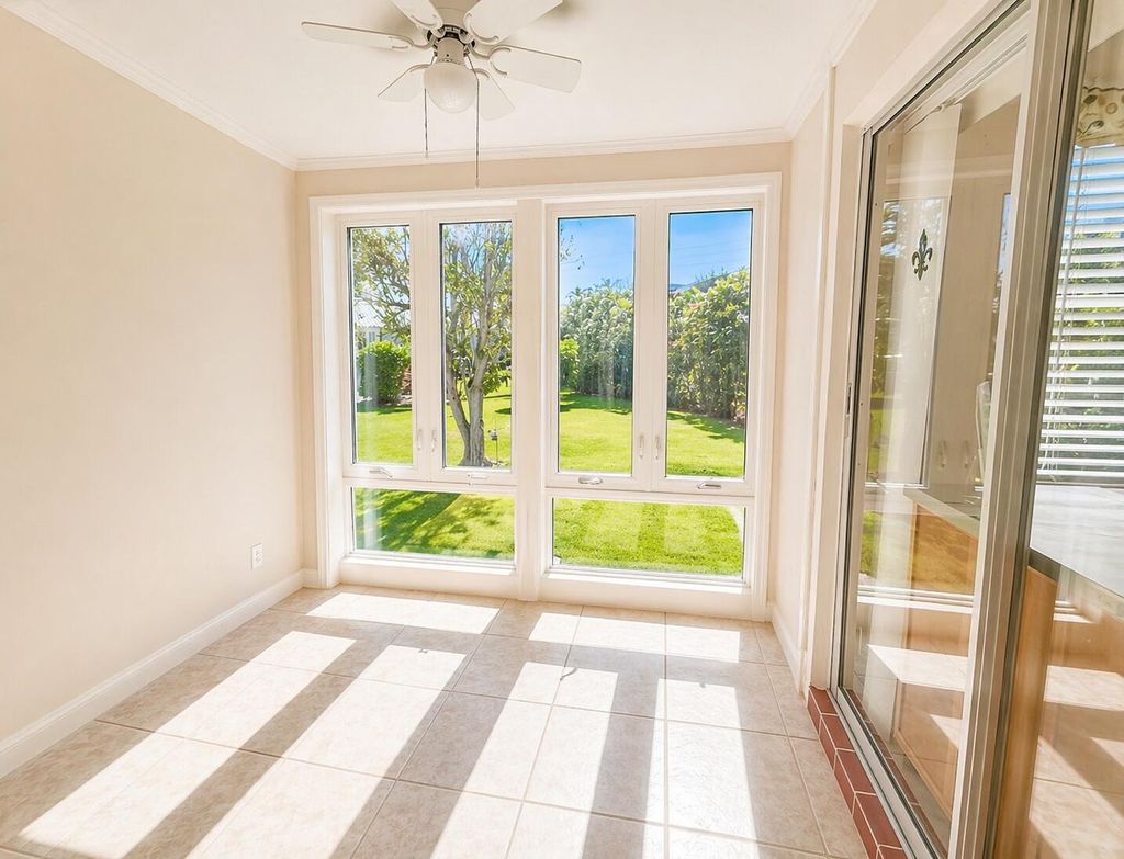 Photo of 33 Colonial Club Drive #203, Boynton Beach, FL 33435 (MLS # B26016637)