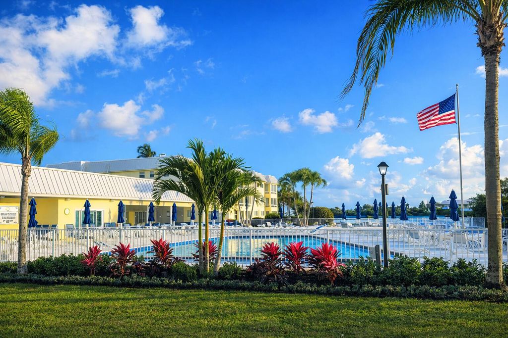 Photo of 33 Colonial Club Drive #203, Boynton Beach, FL 33435 (MLS # B26016637)