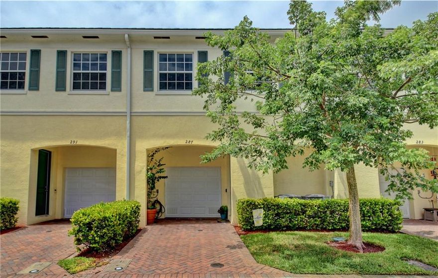 LIVE IN ORCHID GROVE!  Beautiful newer townhouse (2016) has 3 bedrooms & 2.5 baths plus 1 car garage! Kitchen/dining/living room & 1/2 bath all on 1st level, 2nd level has 3 bdrms & 2 full baths.  Carpeting up steps & entire top level were recently replaced with beautiful wood flooring! Master bedroom is very spacious and has many custom features including a HUGE walk in closet with custom shelves & bins for additional storage.  New washer & dryer located on top level in hallway with added storage shelves & lighting. Friendly community has large heated pool with water view & exercise room.  Very low HOA fee ($255.00 per mo) includes security patrol, basic cable TV, alarm & internet, etc. Great location close to beach & I95.  Owner occupied & prefer 24 hr notice to show.  Call today!