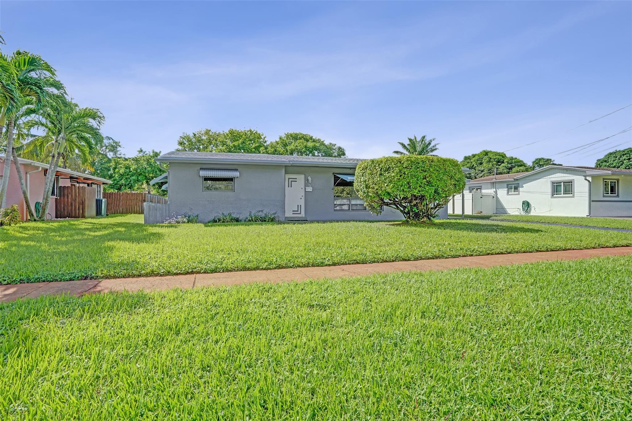 Priced to make it your own. This is a perfect flip opportunity and could be a short term rental with No HOA in the City of Plantation! Close to hospitals, highways and shopping. This home boast 3 bedrooms, 2 baths , florida room and utility room 2025 roof, beautiful large yard. The possibilities are endless, showings by appointment only.