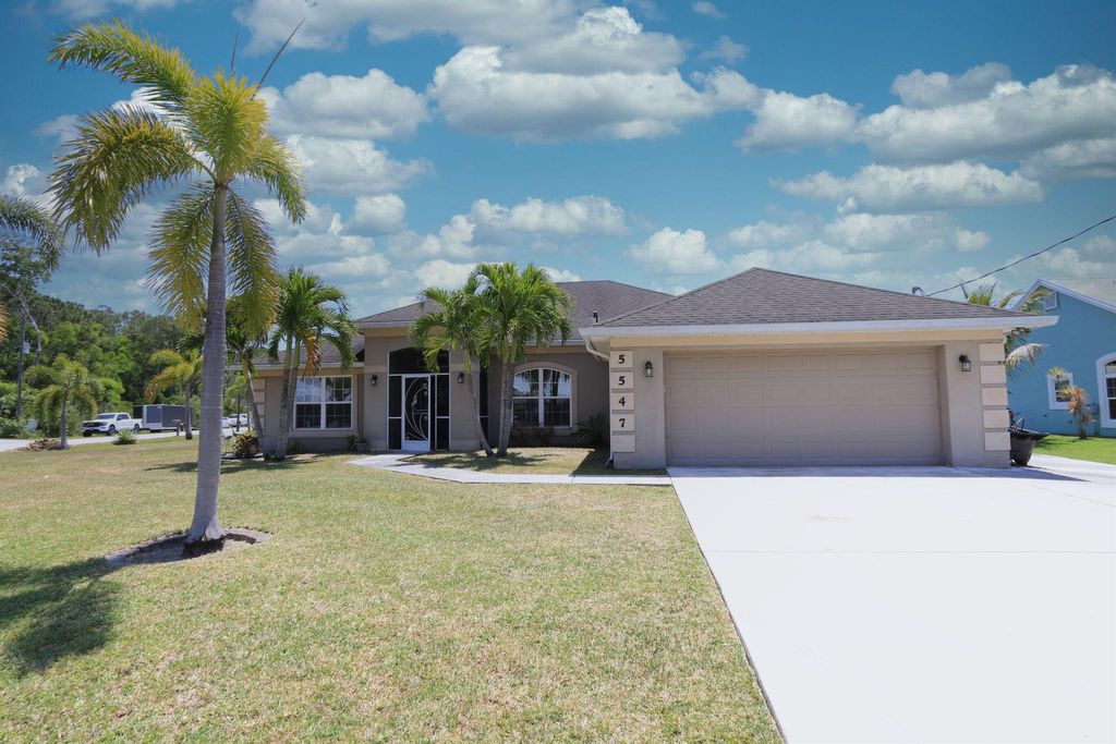 Photo of 5547 NW Cordrey Street, Port Saint Lucie, FL 34986 (MLS # R11085252)