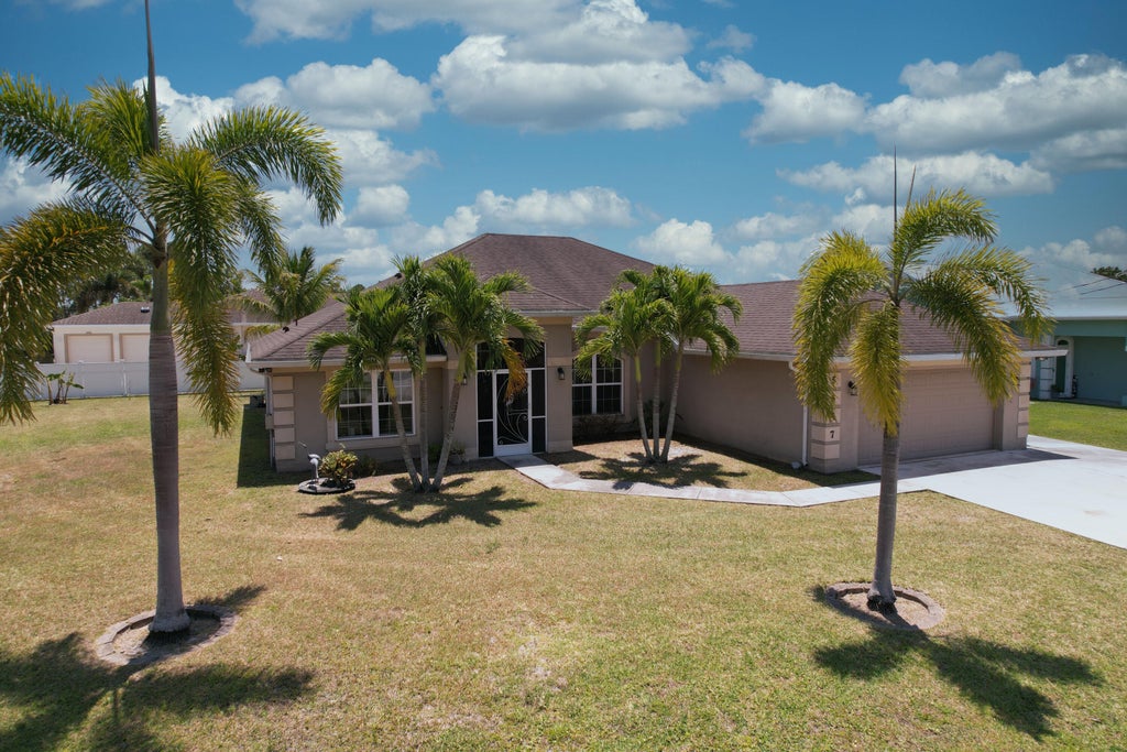 Photo of 5547 NW Cordrey Street, Port Saint Lucie, FL 34986 (MLS # R11085252)