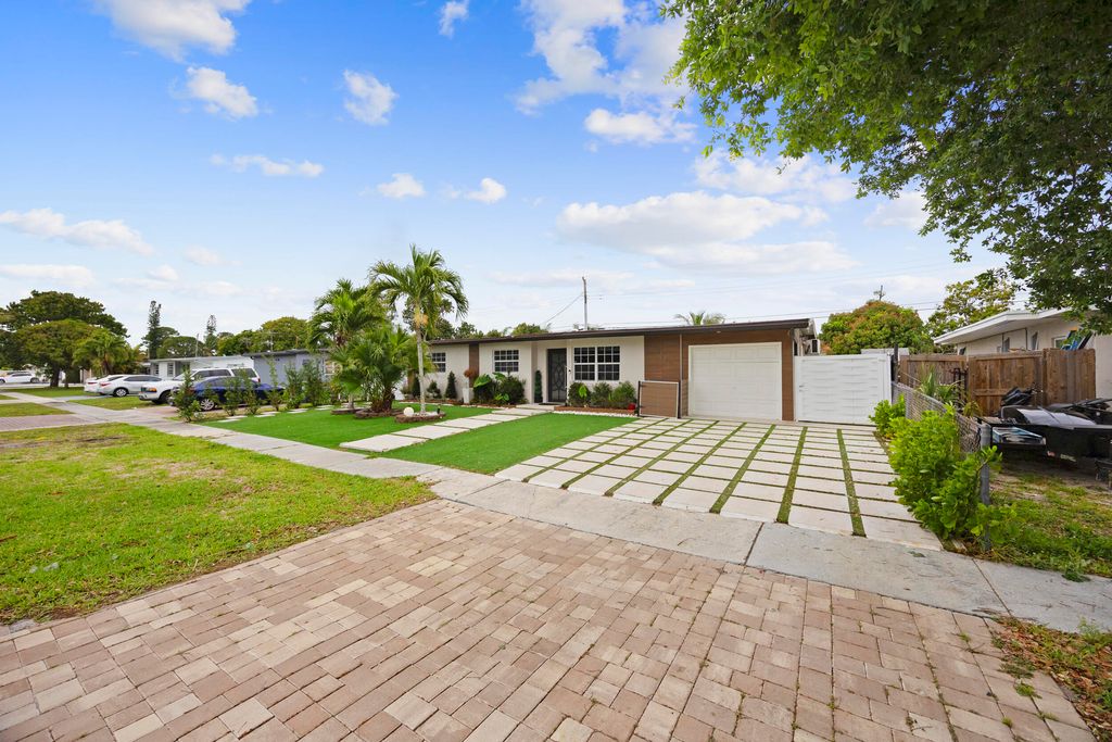 Photo of 1895 Violet Avenue, West Palm Beach, FL 33415 (MLS # B26010041)