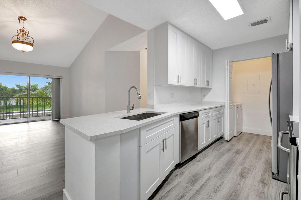 Photo of 3111 Clint Moore Road #202, Boca Raton, FL 33496 (MLS # R11002292)