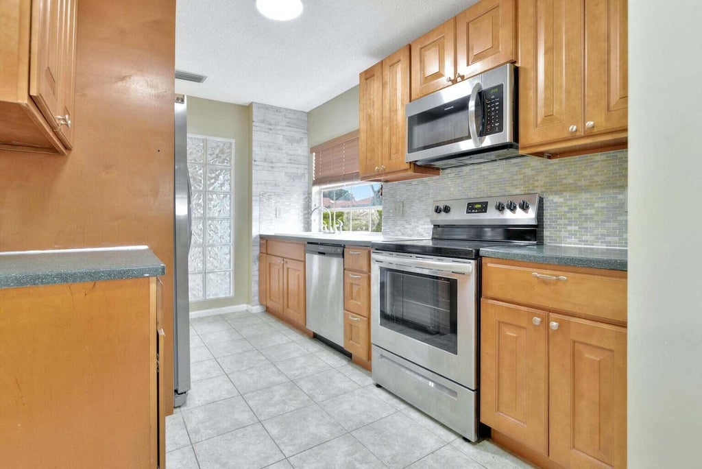 Photo of 6606 Via Regina, Boca Raton, FL 33433 (MLS # R10935645)