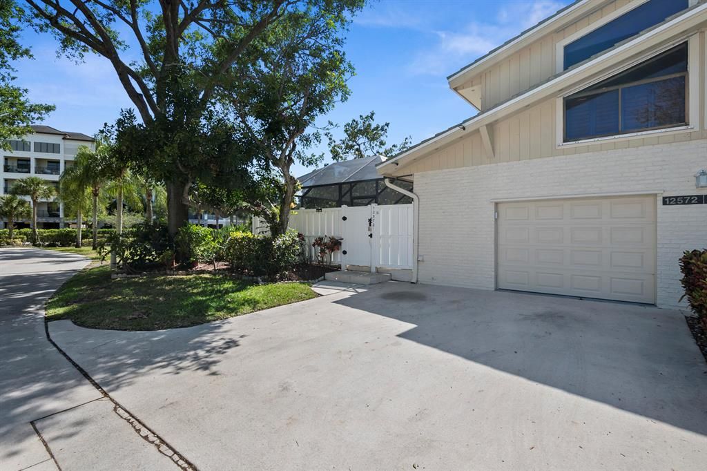 Photo of 12572 Woodmill Drive, Palm Beach Gardens, FL 33418 (MLS # R10875775)
