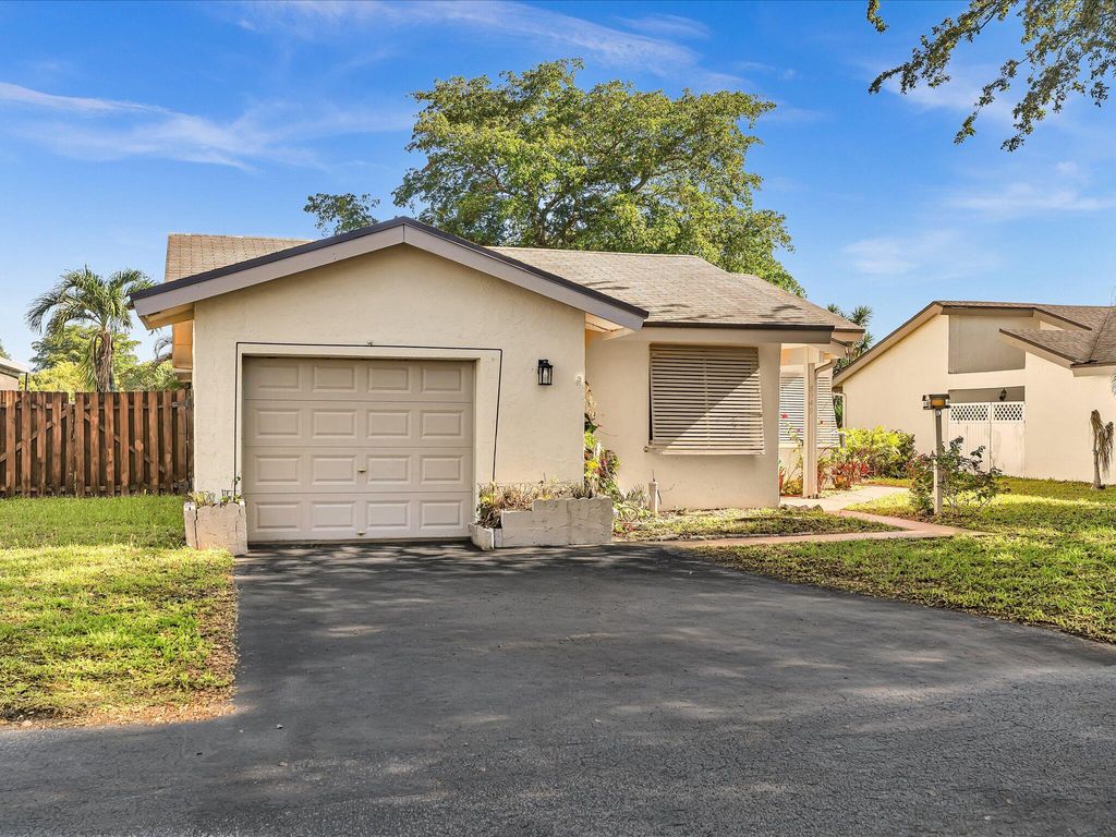 Photo of 8949 NW 9th Place, Plantation, FL 33324 (MLS # B26026011)