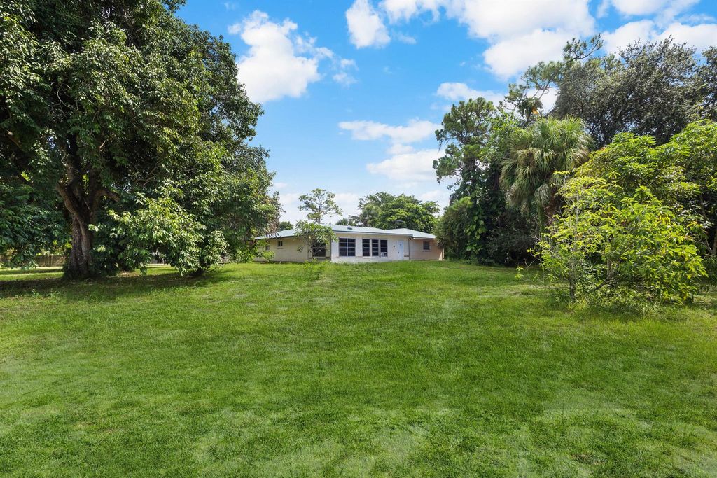 Photo of 16790 E Glasgow Drive, Loxahatchee Groves, FL 33470 (MLS # R11112401)