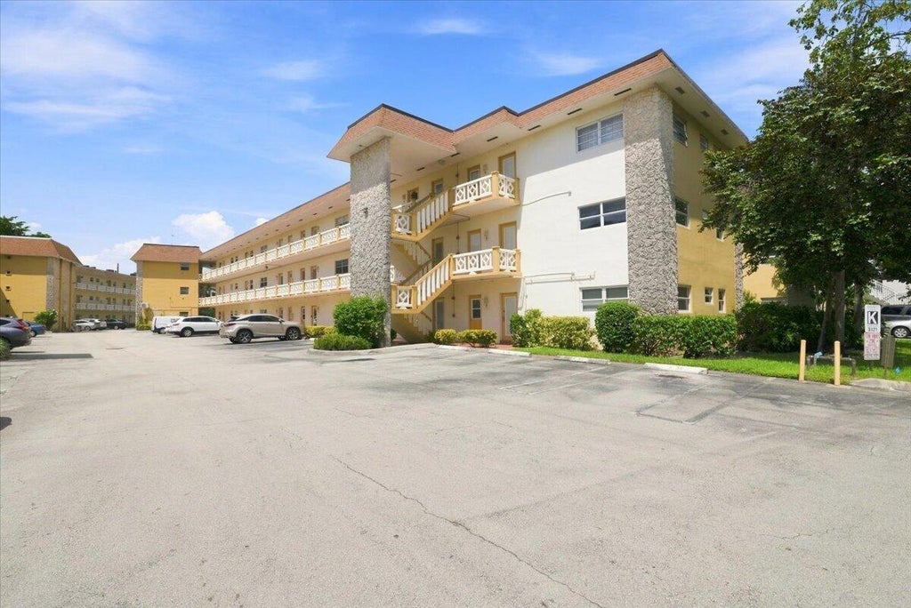 Photo of 5121 W OAKLAND PARK BLVD #109, Lauderdale Lakes, FL 33313 (MLS # B26073879)