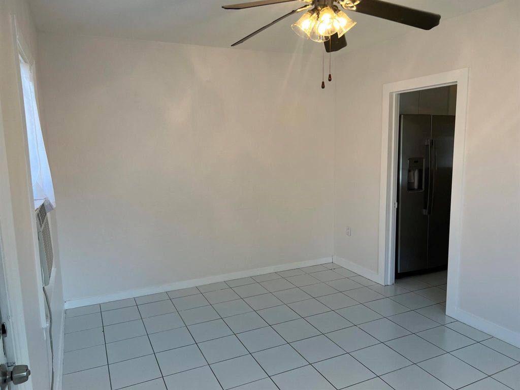 Photo of 311 S J Street, Lake Worth Beach, FL 33460 (MLS # R11049895)