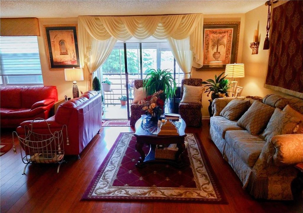 Photo of 1100 Saint Charles Pl #216, Pembroke Pines, FL 33026 (MLS # F10384158)
