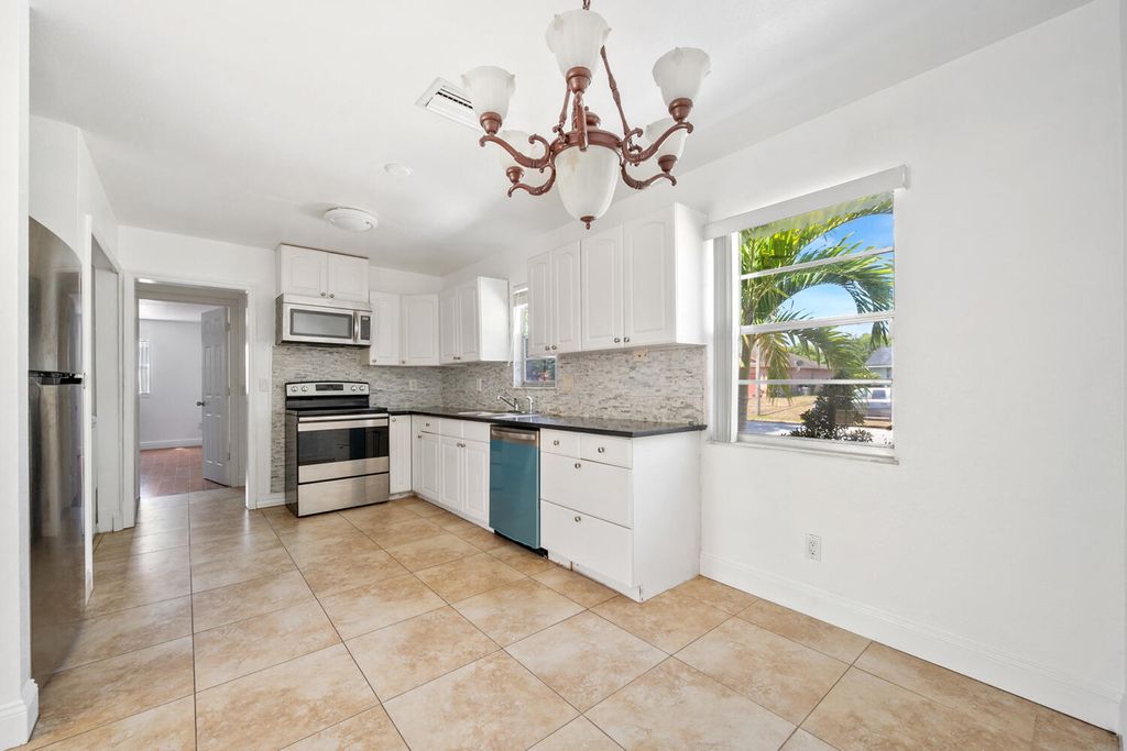 Photo of 3533 SW Rosardo Street, Port Saint Lucie, FL 34953 (MLS # R10982249)