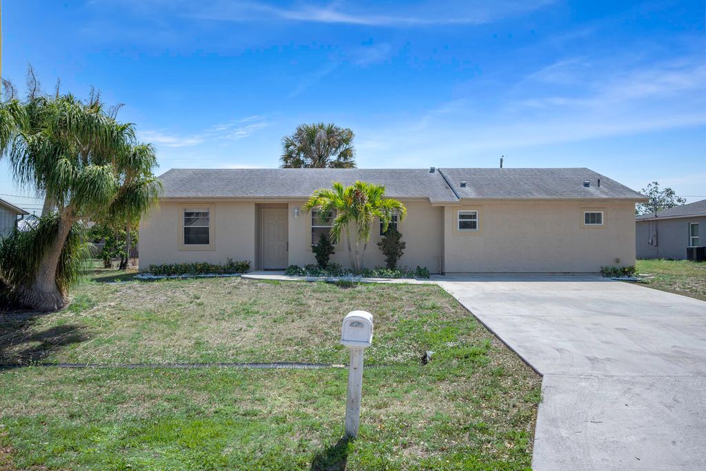 Photo of 3533 SW Rosardo Street, Port Saint Lucie, FL 34953 (MLS # R10982249)