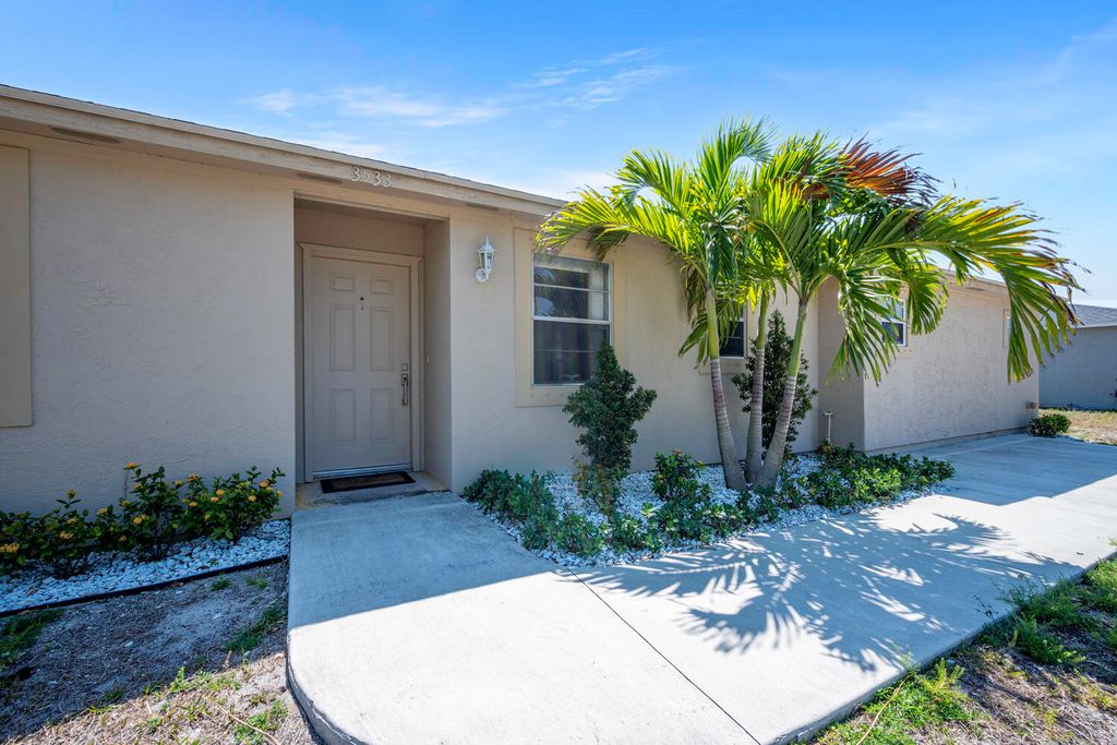 Photo of 3533 SW Rosardo Street, Port Saint Lucie, FL 34953 (MLS # R10982249)