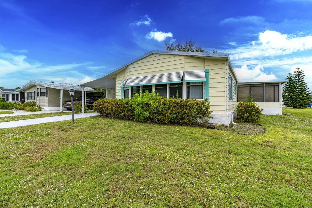 Photo of 2791 SW Pontiac Place, Stuart, FL 34997 (MLS # R11149035)