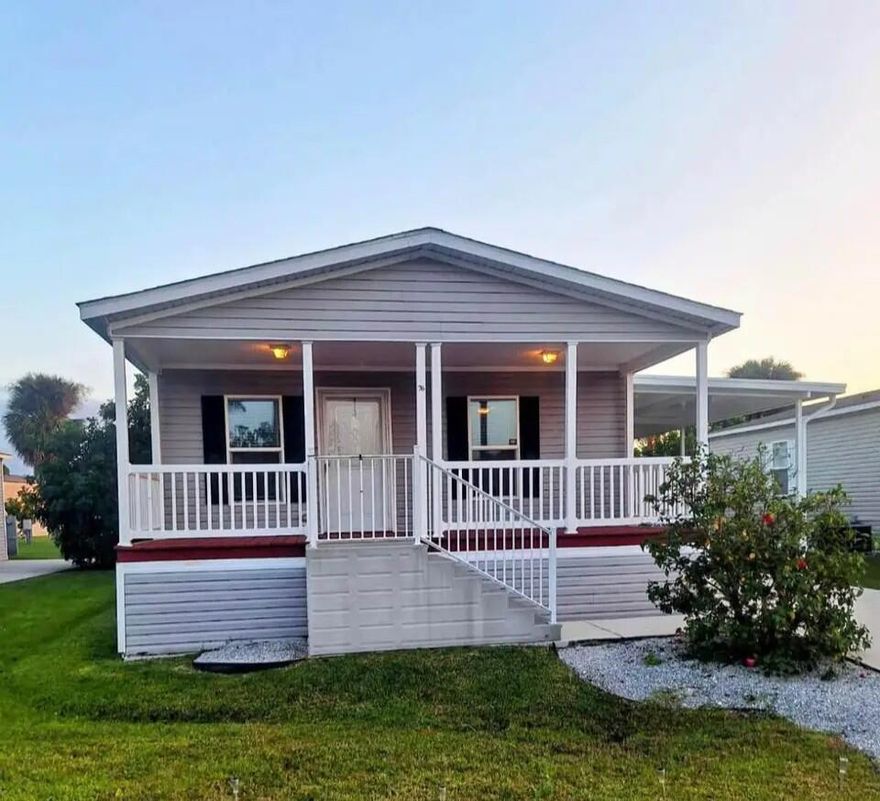 Welcome to Sandhill Shores in Fort Pierce! This 2020 double-wide manufactured home on leased land offers modern comfort with an inviting open floorplan centered around a spacious great room—the true heartbeat of the home.  Enjoy morning coffee or evening chats with neighbors on the full-length covered front porch. Inside, you'll find storage galore, including walk-in closets, an oversized kitchen pantry, abundant cabinetry in the bathrooms and the laundry room, with an exterior storage unit for your beach chairs. Speaking of the beach, a short 15 minute drive will put your toes in the sand.  Sandhill Shores offers a vibrant lifestyle with a clubhouse, pool, shuffleboard, and planned activities in a friendly, active community,iIdeally located near shopping, dining, entertainment.