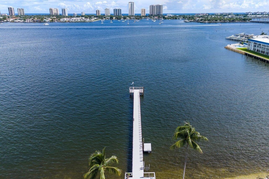 Photo of 3040 Lake Shore Drive #502, Riviera Beach, FL 33404 (MLS # B26088241)