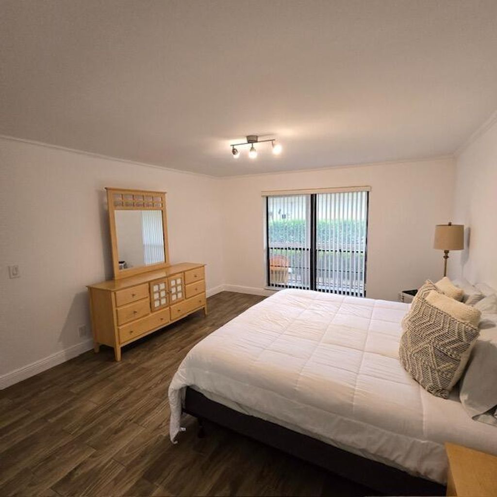 Photo of 602 Brackenwood Cove, Palm Beach Gardens, FL 33418 (MLS # R11127062)