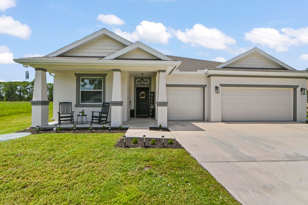 Photo of 6128 NW DENSAW Terrace, Port Saint Lucie, FL 34986 (MLS # B26085118)