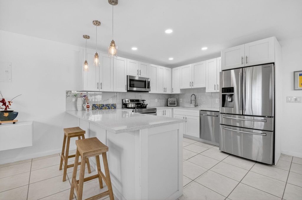 Photo of 154 Valencia G #G, Delray Beach, FL 33446 (MLS # R11143311)