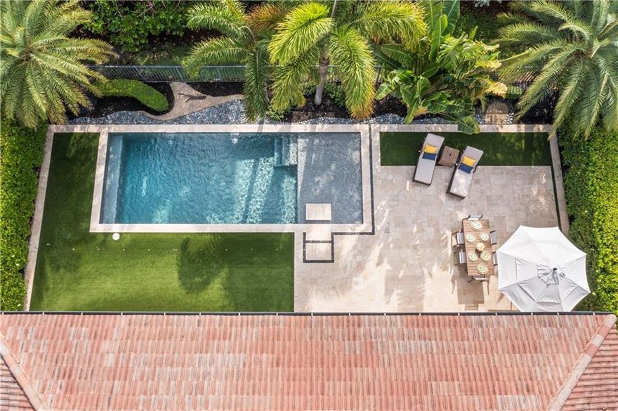 $250K in upgrades! Tropical paradise right in your back patio just in time for summer! Salt system heated/cooled pool w/LED lights, water features, 7ft sun shelf, extended patio area w/turf ideal for sunbathing & entertaining. Popular Hastings model w/4 beds, 2 full baths, 2 half baths, & 3-car garage.  Huge kitchen w/3 inch quartz counters, gas range ideal for chef. Double ovens, stainless steel appliances, plantation shutters, updated light fixtures & Hunter Douglas custom window treatments, & retractable phantom shade in patio area. Spacious primary bed w/sitting area, walk-in closets w/built-ins, 24 inch porcelain tiles in main living areas, custom mud room, 2 pantries, updated landscaping & security cameras. HOA includes resort style amenities, A-rated schools, & 24-hour guard gated.