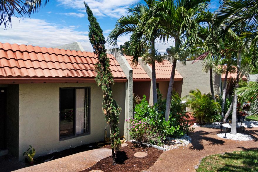 Welcome to Vizcaya Gardens Villas, a hidden gem in the heart of Deerfield Beach! This spacious 2 bedroom, 2 bath villa offers easy South Florida living in an all ages community with reserves in place, just minutes from the beach, shopping, dining, and major highways. Features include a bright open layout, in unit laundry, walk in closets, impact glass, and a private porch perfect for relaxing. Enjoy low maintenance living with HOA maintained exterior components, a heated and chilled pool, clubhouse, beautifully maintained grounds, plenty of guest parking, and 1 assigned parking space.   Some photos have been virtually staged to illustrate the property's potential.