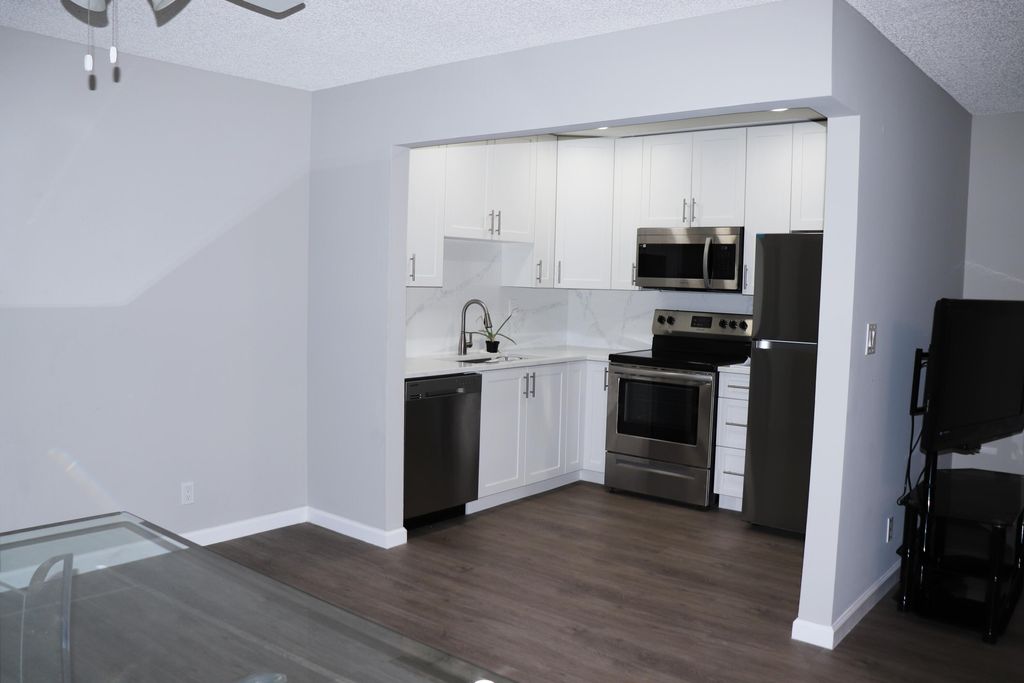 Photo of 801 Flanders Q Dr, Delray Beach, FL 33484 (MLS # B26017411)