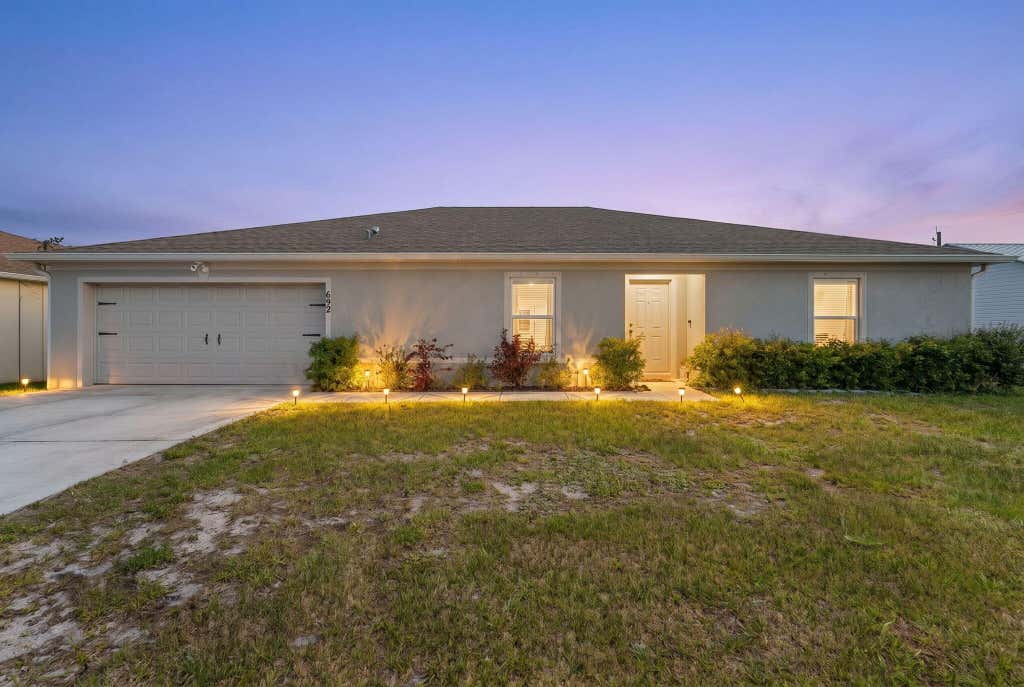 Photo of 692 SW Hamberland Avenue, Port Saint Lucie, FL 34953 (MLS # B26028608)