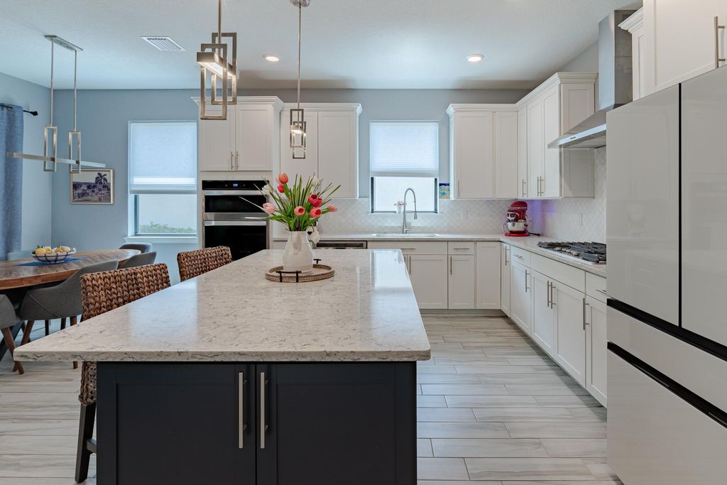 Photo of 548 SE Villandry Way, Port Saint Lucie, FL 34984 (MLS # R11099616)