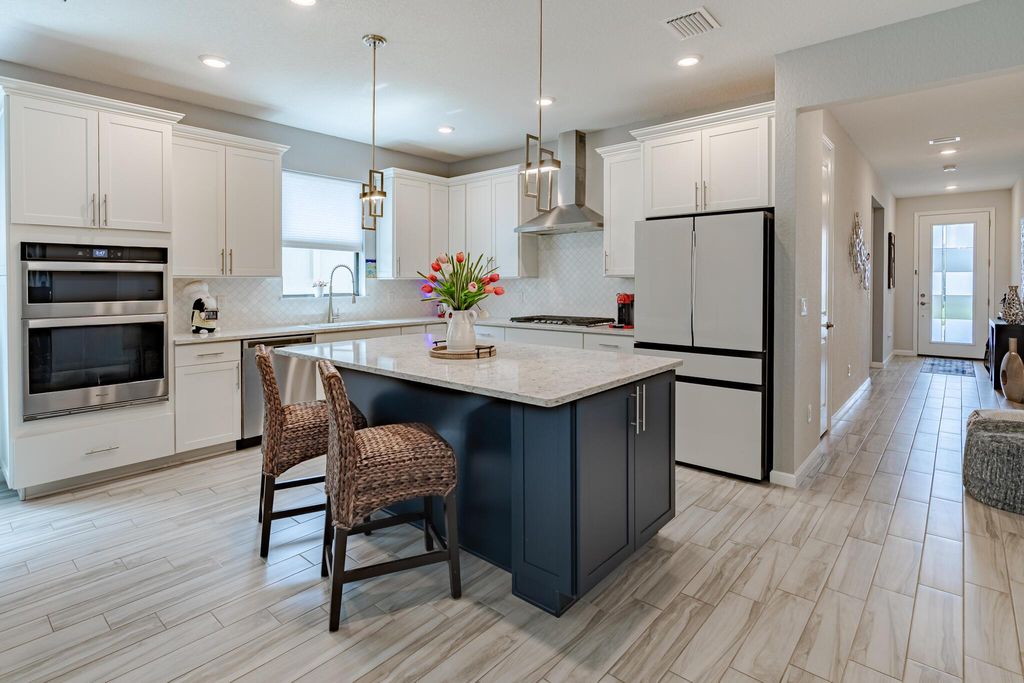 Photo of 548 SE Villandry Way, Port Saint Lucie, FL 34984 (MLS # R11099616)