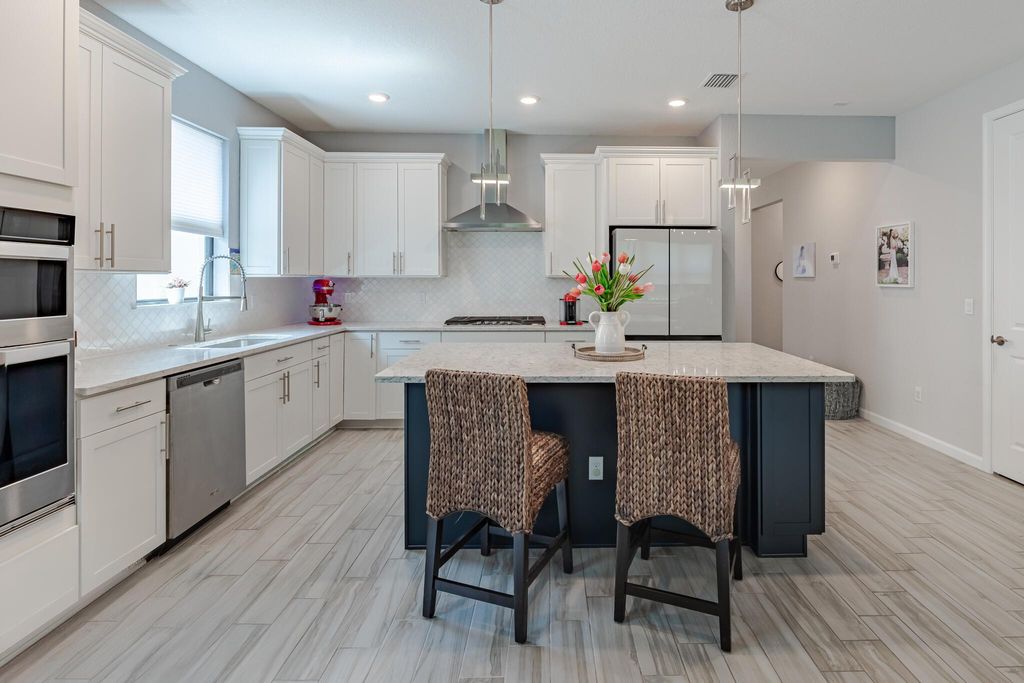 Photo of 548 SE Villandry Way, Port Saint Lucie, FL 34984 (MLS # R11099616)