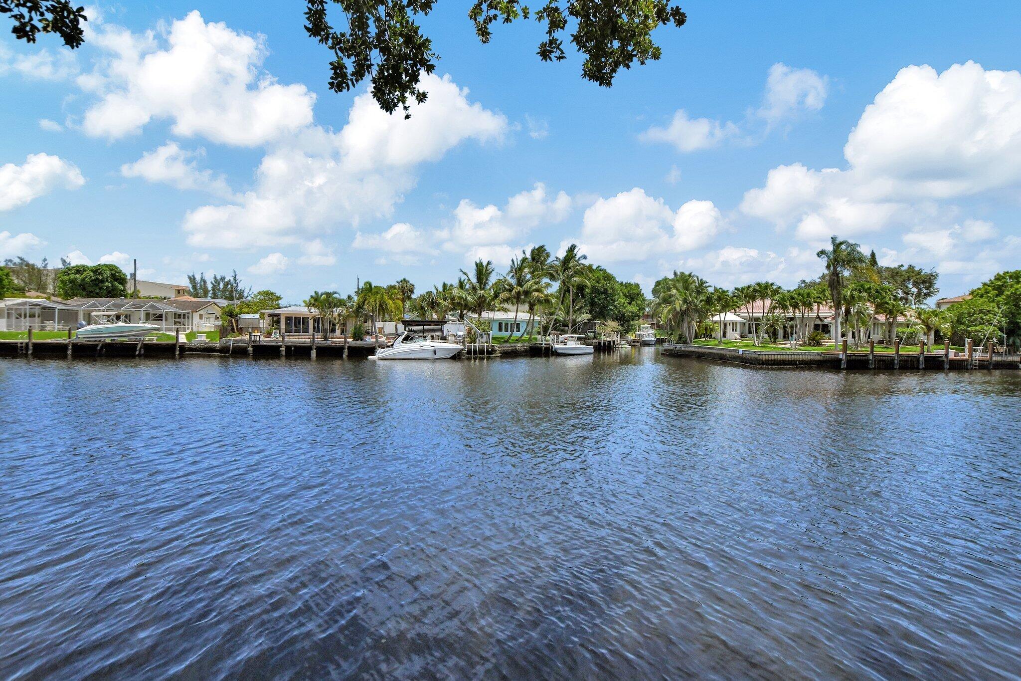 Stunning waterfront views await in this gorgeous 2BR/2BA deluxe condo in sought-after SE Boca! Open kitchen boasts wood cabinets, SS appliances & breakfast bar. Split floor plan offers privacy with water views from primary suite. Bright, move-in ready unit features screened balcony overlooking wide Hillsboro Canal - watch daily boat parades! Premium SE Boca location with Hillsboro Park directly across the street. Amenities include 5 heated pools, boat slips, tennis, fitness center & clubhouse. Minutes to Starbucks, upscale Mizner Park shopping/dining, downtown Boca, Trader Joe's, Fresh Market & pristine beaches. Rent includes gated security, water, trash & cable with HBO. All ages welcome in this waterfront paradise! No pets, pickup trucks, commercial vehicles or motorcycles allowed.