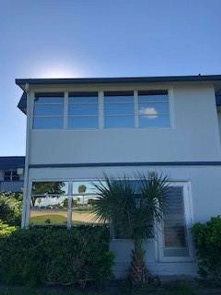 NW corner of King's Point near the Main Clubhouse.  (Entrance on Atlantic Ave)  Great views from the enclosed porch from this 2nd floor 1BR, 1 1/2BA condo.  Located near the elevator.  Needs TLC.  Kitchen has updated cabinets, counter top, and lighting.  Enclosed porch is air conditioned and faces east.  Easy to show.
