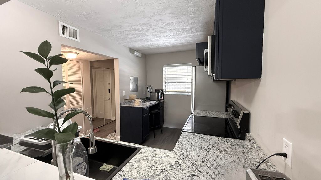 Photo of 2925 SW 22nd Avenue #203, Delray Beach, FL 33445 (MLS # B26056451)