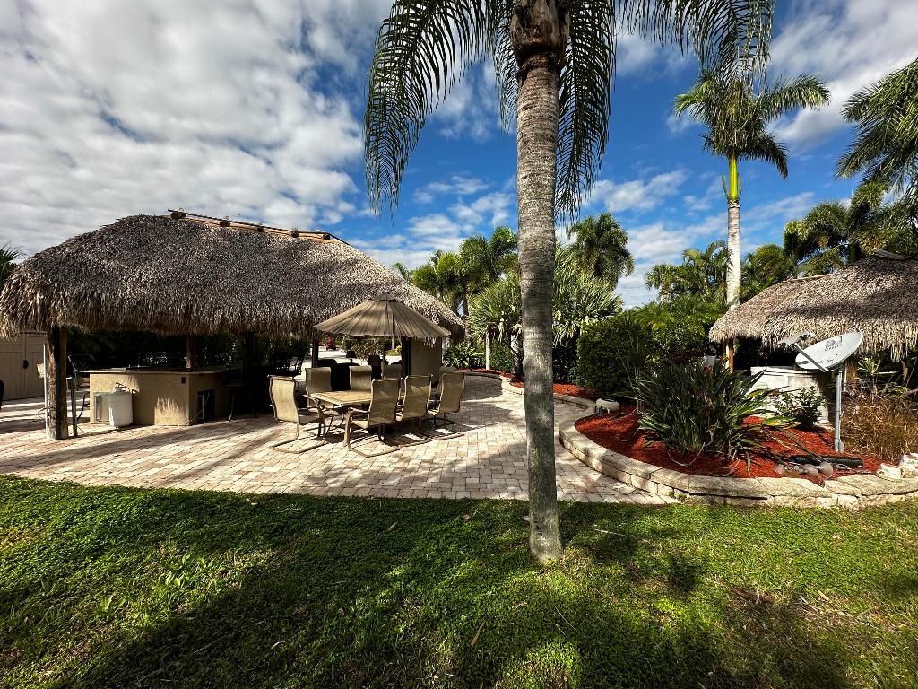 Photo of 13 NW Boundary Drive, Port Saint Lucie, FL 34986 (MLS # R11127593)