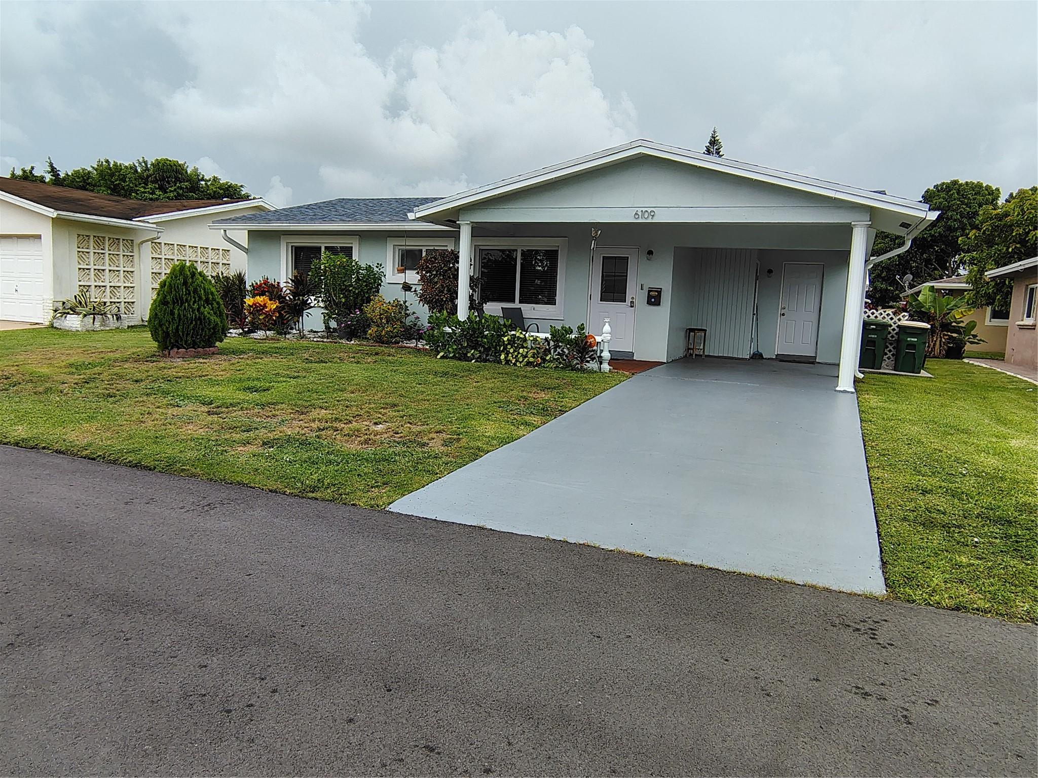 Lovely 2 bed 2 bath single family home in the Mainland of Tamarac. No age restrictions. Updated bathrooms and kitchen. Mirrored walls in Living room. Enclosed back patio. Washer and dryer in unit. One car carport. Community pool. Association application & approval required. Property available September 1st.2025