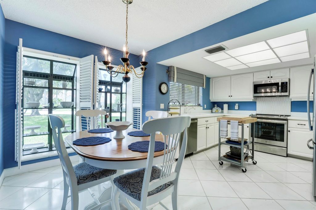 Photo of 29 Edinburgh Drive, Palm Beach Gardens, FL 33418 (MLS # R11080002)