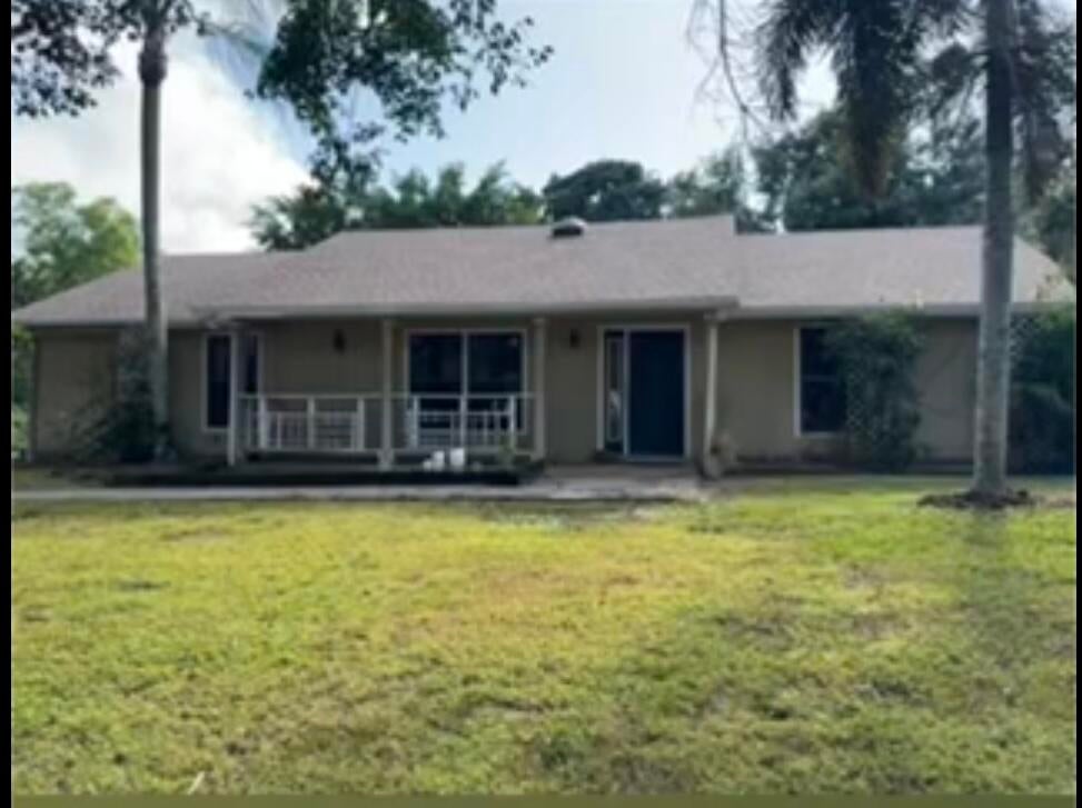 Photo of 16114 E Aintree Drive, The Acreage, FL 33470 (MLS # R11056491)
