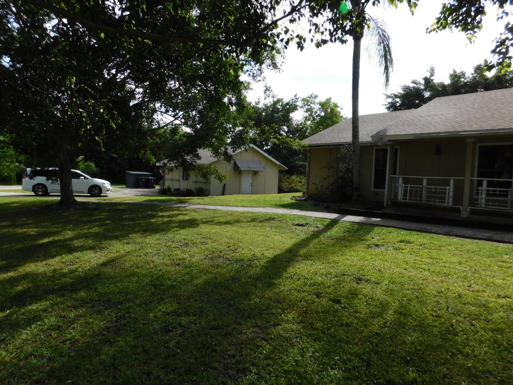 Photo of 16114 E Aintree Drive, The Acreage, FL 33470 (MLS # R11056491)